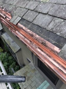 copper gutters on a slate roof in Newton, MA